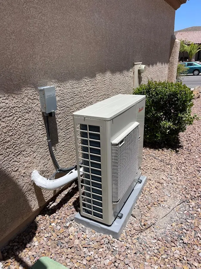 Residential air conditioning condenser unit in Gonzalez